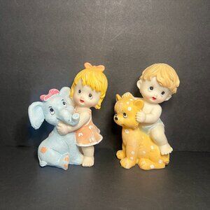 Vintage Rare Set of 2 Resin Girl & Boy Figures holding an Elephant & Lion Toy 5"